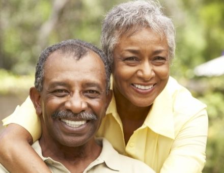 Senior black couple smiling - for dentures info from Bayou Dental Group in Monroe, LA