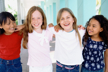 Four girls of diverse ethnicity, for information on dental visits for developmentally disabled children, from Bayou Dental Group in Monroe, LA